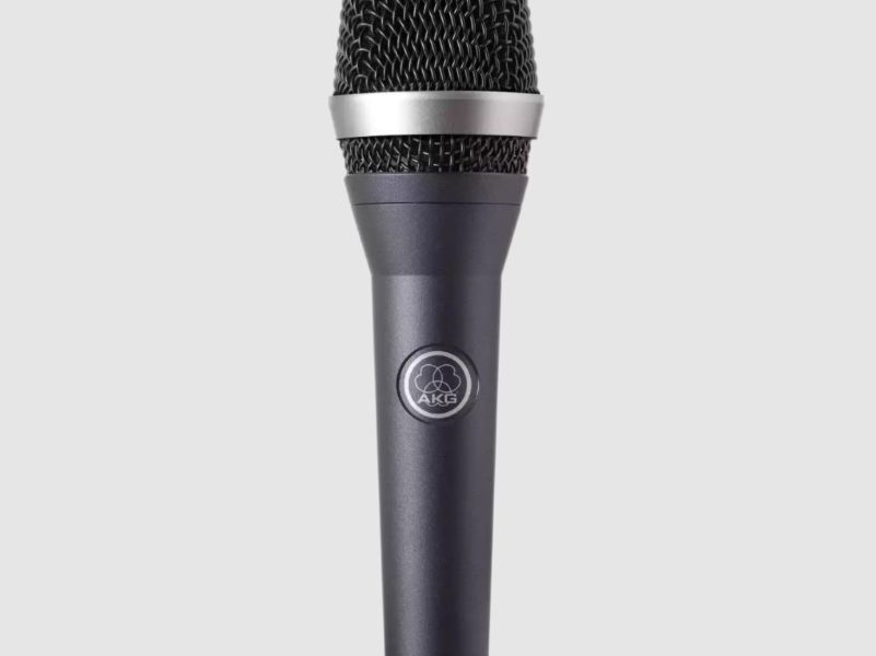 Black AKG professional vocal microphone, vertical view