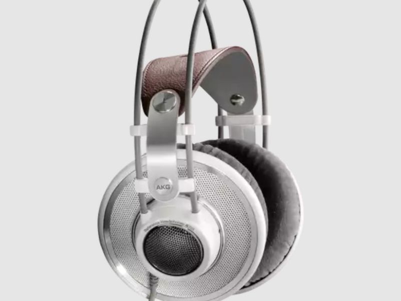 Silver and black professional headphones with leather arch, wired
