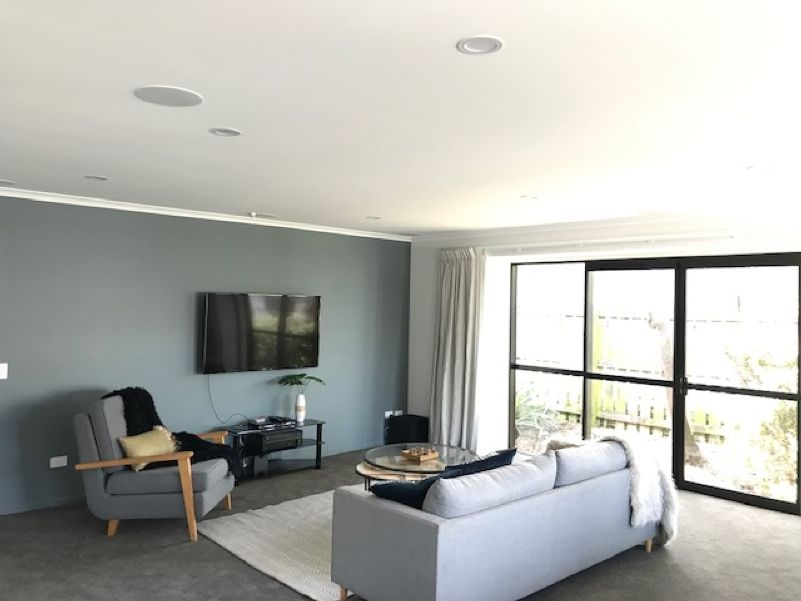 View of the living room and tv, installed by Vision, in the 2019 Charity House