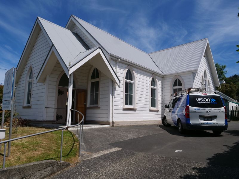 Vision van outside the church